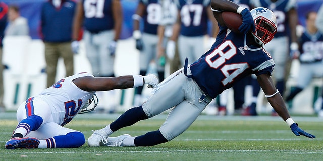 Deion Branch, #84 of the New England Patriots, stretches out after catching a pass against of the Buffalo Bills during the game on Nov. 11, 2012 at Gillette Stadium in Foxboro, Massachusetts. 