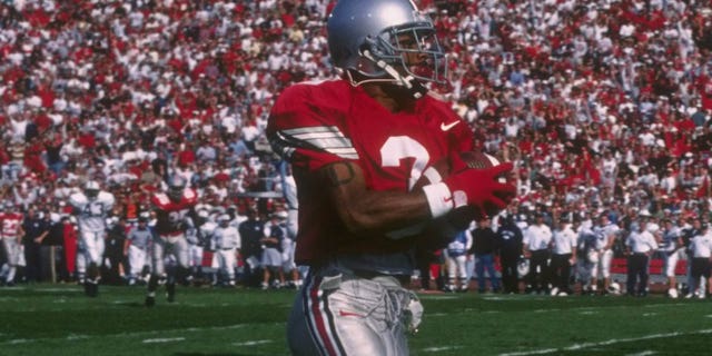 Dimitrious Stanley of the Ohio State Buckeyes runs downfield during a game against the Penn State Nittany Lions at Ohio Stadium in Columbus, Ohio.
