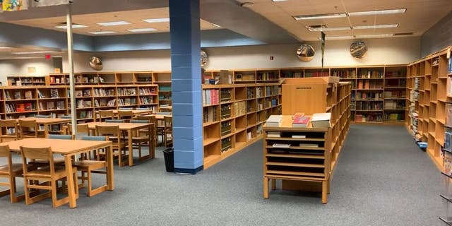 Photo full library shelves after Governor DeSantis signed into law re-evaluating the books allowed in Florida Schools. 