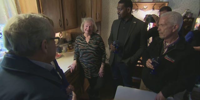 Ohio Gov. Mike DeWine, EPA Administrator Michael Regan and Rep. Bill Johnson drank tap water during a visit to a woman's home near the site of the East Palestine train derailment, Tuesday, Feb. 21, 2023.