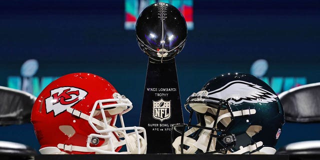 A view of the Vince Lombardi Trophy and the helmets of the Kansas City Chiefs and the Philadelphia Eagles before a press conference for NFL Commissioner Roger Goodell at Phoenix Convention Center Feb. 8, 2023, in Phoenix, Ariz. 