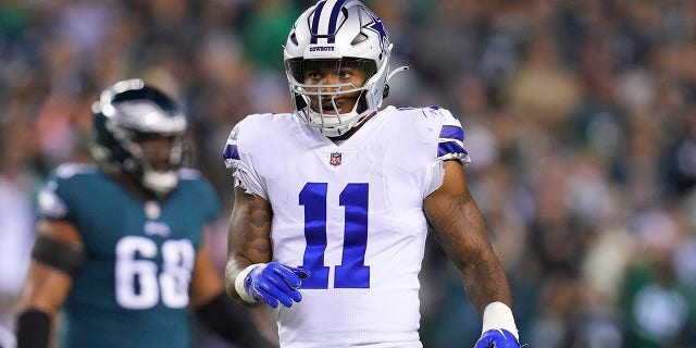 Micah Parsons #11 of the Dallas Cowboys looks on against the Philadelphia Eagles at Lincoln Financial Field on October 16, 2022 in Philadelphia, Pennsylvania.