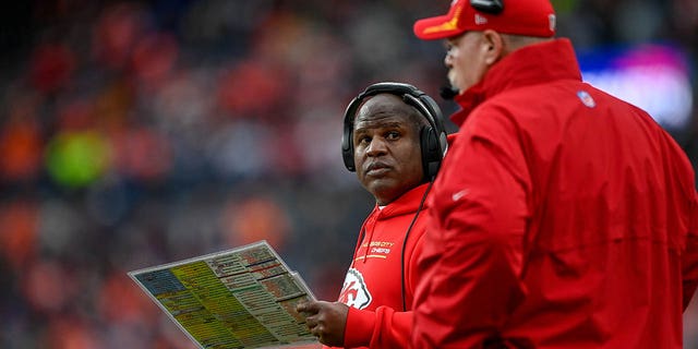 Offensive coordinator Eric Bieniemy and head coach Andy Reid of the Kansas City Chiefs during a Broncos game at Empower Field at Mile High on Jan. 8, 2022, in Denver, Colorado.