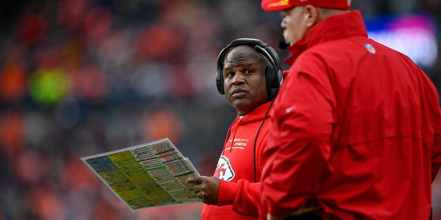 Offensive coordinator Eric Bieniemy and head coach Andy Reid of the Kansas City Chiefs during a Broncos game at Empower Field at Mile High on Jan. 8, 2022, in Denver, Colorado.