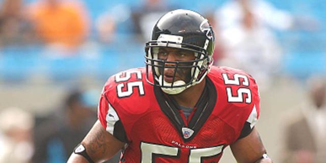 Eric Johnson #55 of the Atlanta Falcons warms up before an NFL football game against the Carolina Panthers on October 2, 2004 at Ericsson Stadium in Charlotte, North Carolina.