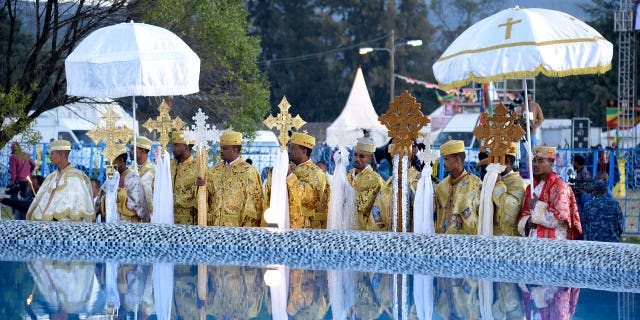 Ethiopian Christians celebrate Timkat or Epiphany, a colorful festival celebrated across Ethiopia to commemorate the baptism of Jesus Christ by John the Baptist in the Jordan River, on January 19, 2023 in Addis Ababa, Ethiopia.