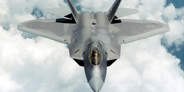 An F-22 Raptor flies by in this undated image provided by Lockheed Martin.