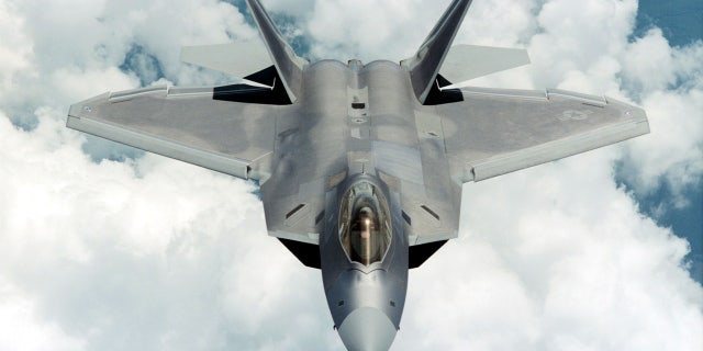 An F-22 Raptor flies by in this undated image provided by Lockheed Martin.