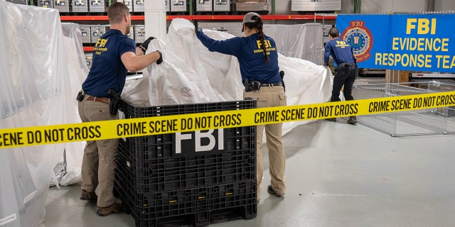 (Washington, D.C) – FBI Special Agents assigned to the Evidence Response Team process material recovered from the High Altitude Balloon recovered off the coast of South Carolina.  The material was processed and transported to the FBI Laboratory in Quantico, VA.  - FBI Photo