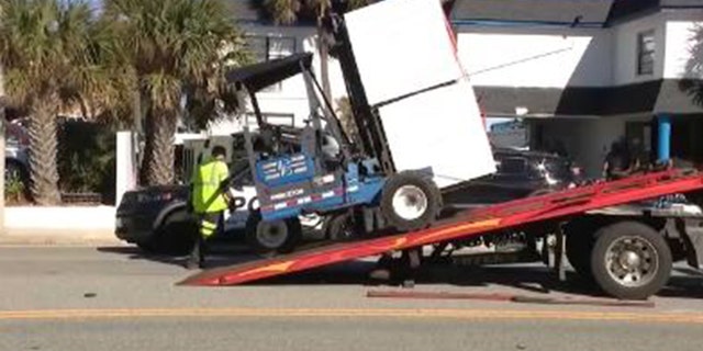 The forklift driver carrying the load of materials reportedly did not see the woman and ran her over, police said.