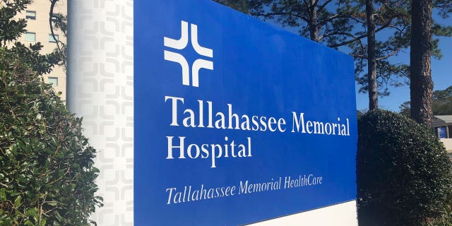A sign stands outside Tallahassee Memorial Hospital on February 3, 2023, in Tallahassee, Florida.