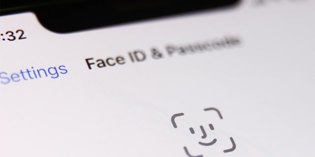 Face ID icon displayed on a phone screen.