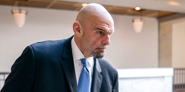 FILE: Sen. John Fetterman, D-Pa., leaves an intelligence briefing on the unknown aerial objects the U.S. military shot down this weekend at the Capitol in Washington, Feb. 14, 2023. 