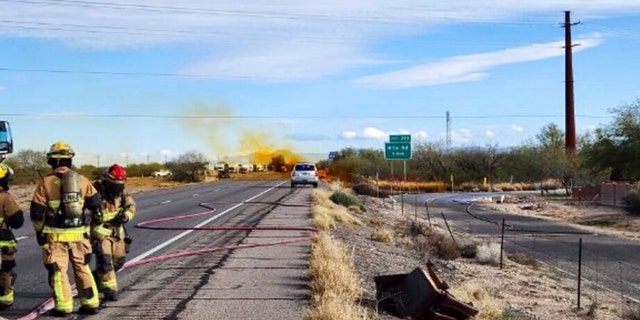 This image provided by the Arizona Department of Public Safety shows what the department says was an accident involving a commercial tanker truck that caused a hazardous material to leak onto Interstate 10 outside Tucson, Arizona, on Tuesday, Feb. 14, 2023, prompting state troopers to shut down traffic on the freeway.