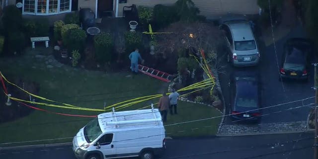 The Suffolk County Police Second Precinct reports that three people fell into a 6-foot sinkhole in Huntington Station on Jan. 26.