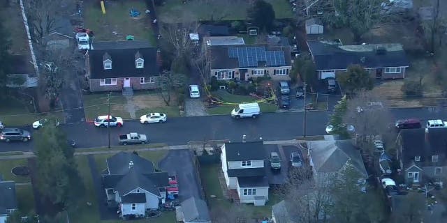 A 6-foot sinkhole opened up in front of a home in Huntington Station, Long Island, a suburban hamlet and census-designated place in New York.