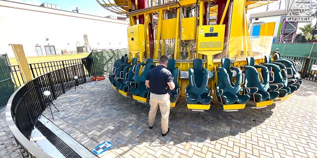 Representatives Austrian ride manufacturer, Funtime Handels inspect the Freefall drop tower ride at Icon Park in Orlando Florida, Thursday, February, 23, 2023. Ride goer, Tyree Sampson died when he fell from the ride in March last year. 