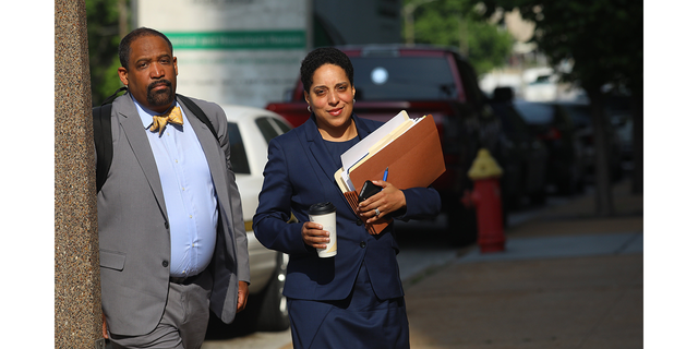 St. Louis Circuit Attorney Kim Gardner, right, and Ronald Sullivan, a Harvard law professor, arrive at the Civil Courts building on May 14, 2018. 