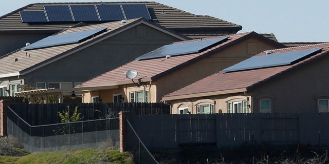 Solar panels on rooftops of a housing development in Folsom, California, on Feb. 12, 2020. Lawmakers in Georgia are looking to regulate the installation of rooftop solar panels. The lawmakers claim that some companies are ripping off consumers.