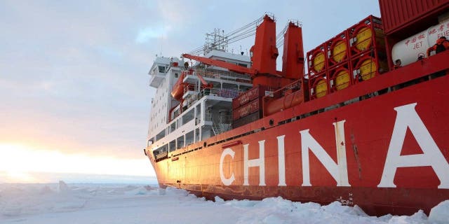 China's research icebreaker Xuelong arrives at the roadstead off the Zhongshan station in Antarctica, Dec. 1, 2018. The research team has carried out unloading work by using a helicopter. 