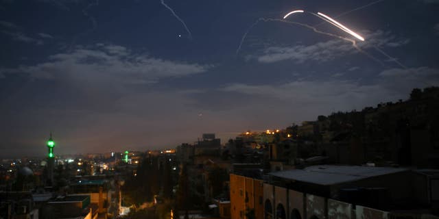 Syrian air defense batteries respond to what Syrian state media said were Israeli missiles targeting Damascus on Jan. 21, 2019. (Getty)