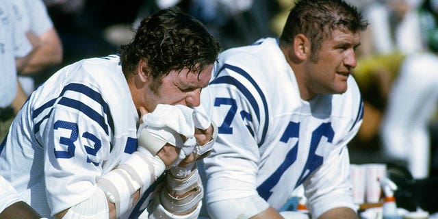 Fred Miller, #76 of the Baltimore Colts, looks on from the sidelines during an NFL Football game circa 1971. 