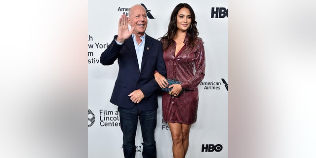 Bruce Willis and his wife Emma Heming Willis pose for a photo together back in 2019.