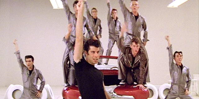 John Travolta singing Greased Lightning in Grease