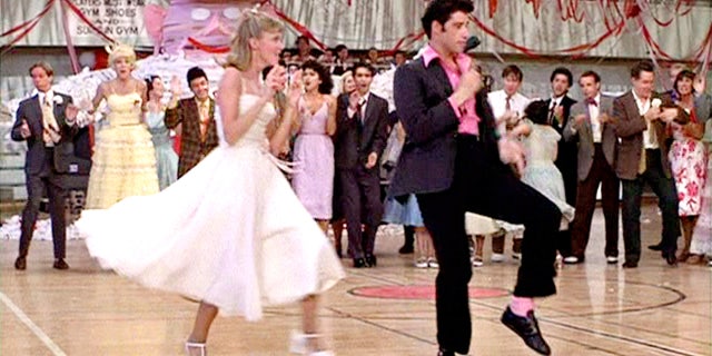 Olivia Newton-John and John Travolta filming the dance scene on "Grease"