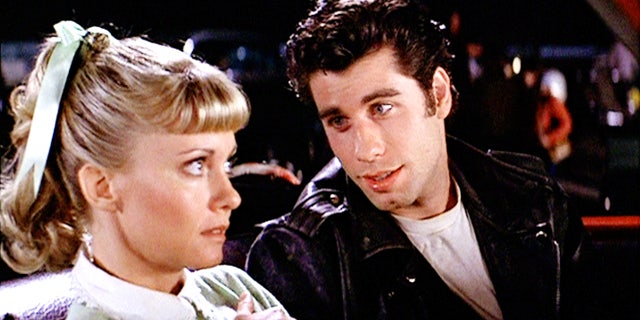 Olivia Newton-John and John Travolta filming the drive-in scene in Grease