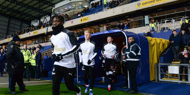 Christian Etsu of Newcastle United runs outside to warm up during the FA Cup Fourth Round replay match between Oxford United and Newcastle United at Kassam Stadium on February 04, 2020 in Oxford, England. 