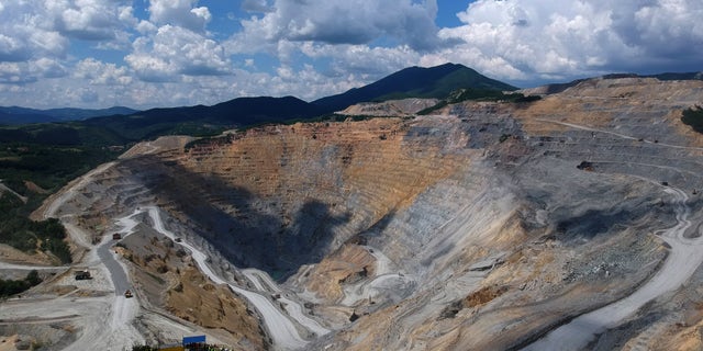 A Chinese-owned open pit copper mine is pictured on June 11, 2021.