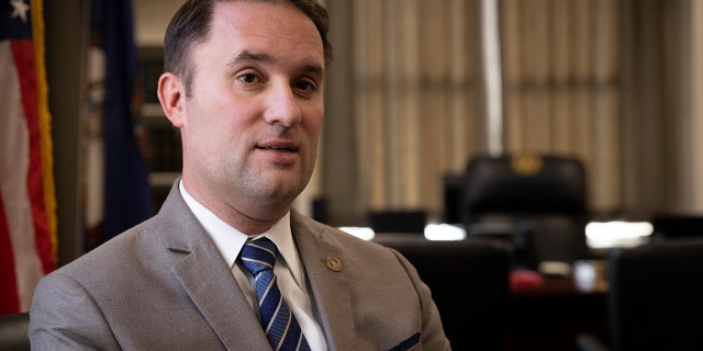 Attorney General Jason Miyares sits in his office Jan. 19, 2022, in Richmond, Virginia.