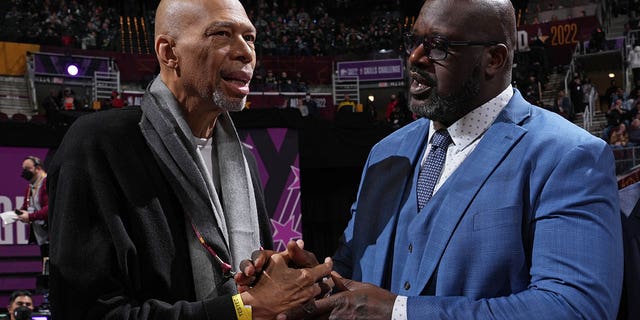 Kareem Abdul Jabbar, left, Shaquille O'Neal and Julius Erving (not pictured) pose for a photo during the Taco Bell Skills Challenge as part of 2022 NBA All Star Weekend on Feb. 19, 2022 at Rocket Mortgage FieldHouse in Cleveland.