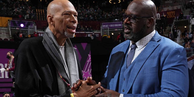 Kareem Abdul Jabbar, left, Shaquille O'Neal and Julius Erving (not pictured) pose for a photo during the Taco Bell Skills Challenge as part of NBA All Star Weekend 2022 on February 19, 2022 at Rocket Mortgage FieldHouse in Cleveland.