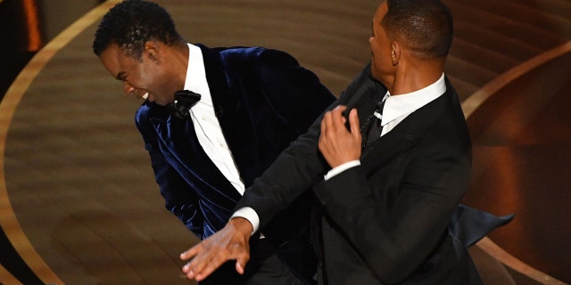 Will Smith, left, took issue with Chris Rock's joke about his wife, Jada Pinkett Smith, leading him to slap the comedian across the face.