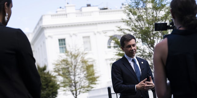 Pete Buttigieg, U.S. Secretary of Transportation, speaks to media outside the West Wing of the White House in Washington, D.C., USA, Tuesday, August 16, 2022. 