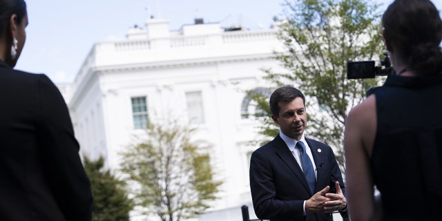 Pete Buttigieg, US secretary of transportation, speaks to members of the media outside of the West Wing at the White House in Washington, D.C., US, on Tuesday, Aug. 16, 2022. 