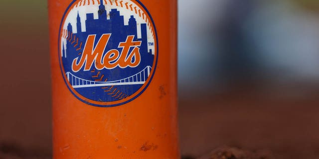 Baseball: New York Mets logo on a bat sleeve facing the Washington Nationals at Nationals Park. 