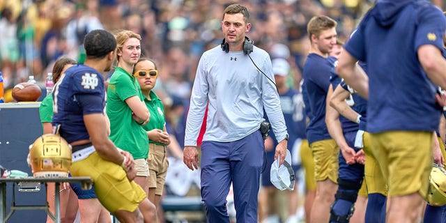 Battling Irish offensive coordinator Tommy Rees during the Blue-Gold spring football game on April 23, 2022, at Notre Dame Stadium in South Bend, Indiana.