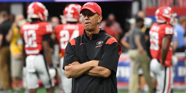 Georgia Bulldogs Offensive Coordinator Todd Monken looks on during warmups before the Chick-Fil-A Kickoff Game between the Oregon Ducks and the Georgia Bulldogs on September 03, 2022, at Mercedes-Benz Stadium in Atlanta, Ga.