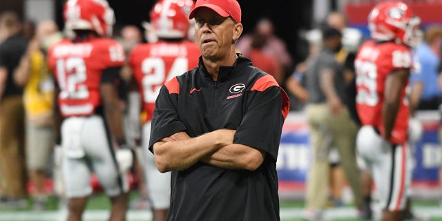 Georgia Bulldogs Offensive Coordinator Todd Monken looks on during warmups before the Chick-Fil-A Kickoff Game between the Oregon Ducks and the Georgia Bulldogs on September 03, 2022, at Mercedes-Benz Stadium in Atlanta, Ga.