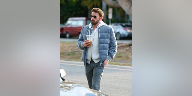 Ben Affleck out and about with his Dunkin' iced coffee.