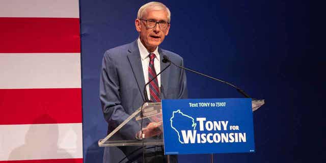 Gov. Tony Evers says he is in favor of keeping University of Wisconsin tuition increases at a "reasonable" level when asked about a bill that would cap increases to the rate of inflation on Feb. 28, 2023, in Madison, Wisconsin.