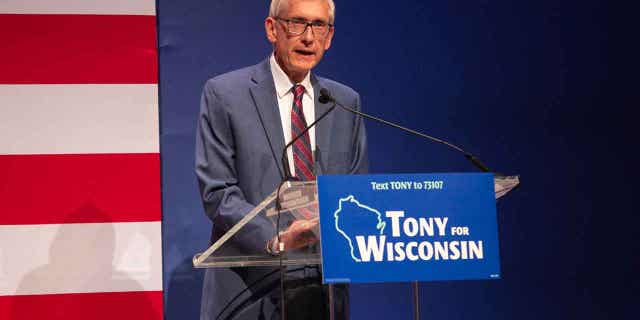Gov. Tony Evers says he is in favor of keeping University of Wisconsin tuition increases at a "reasonable" level when asked about a bill that would cap increases to the rate of inflation on Feb. 28, 2023, in Madison, Wisconsin.