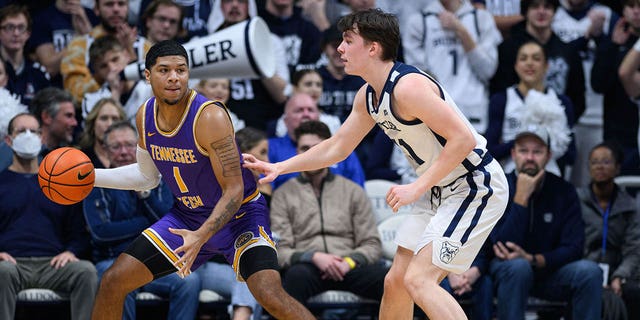 Tennessee Tech Golden Eagles guard Diante Wood (1) returns to the lane against Butler Bulldogs guard Simas Lukosius (41) during the men's college basketball game between the Butler Bulldogs and the Tennessee Tech Golden Eagles on December 3, 2022, at Hinkle Fieldhouse in Indianapolis.  IN. 