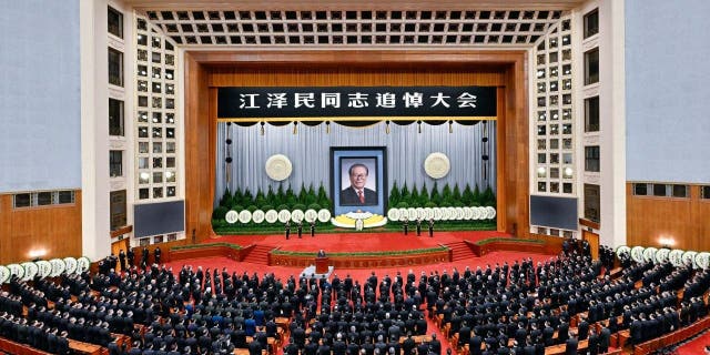 A memorial meeting for Jiang Zemin, a former general secretary of the Chinese Communist Party, is held in the Great Hall of the People in Beijing, Dec. 6, 2022.