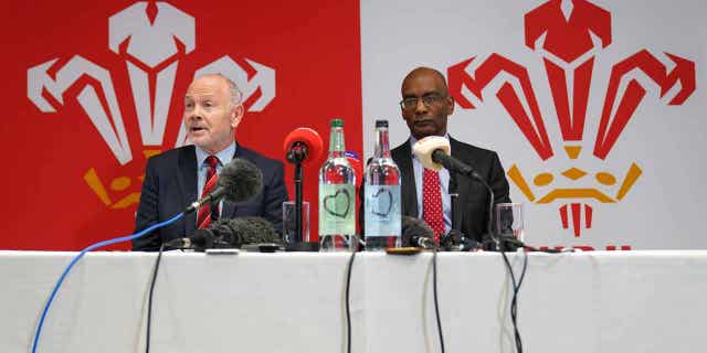 Welsh Rugby Union chairman Leuan Evans, left, and acting chief executive Nigel Walker are shown during a press conference. Evans has vowed to remain as Welsh Rugby Union chair despite allegations of a "toxic culture" at the organization that resulted in chief executive Steve Phillips' resignation on Sunday. Phillips' resignation came after a turbulent week in Welsh rugby following a documentary airing allegations of misogyny, sexism, racism, and homophobia. The mail-voiced choir will not sing "Delilah" before Wales' match in the Six Nations, or at future games, due to the allegations.