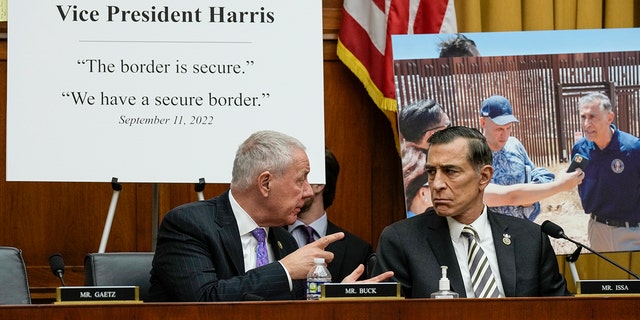 U.S. Rep. Ken Buck, R-CO, left, confers with U.S. Rep. Darrell Issa, R-CA, during a hearing on U.S. southern border security on Capitol Hill, February 01, 2023, in Washington, DC. 