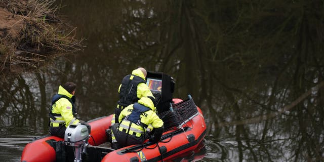 Workers from a private underwater search and recovery company, Specialist Group International, including CEO Peter Faulding (top right) in St Michael's on Wyre, Lancashire, use sonar to search for missing woman Nicola Bulley, 45, who was last seen on the morning of Friday January 27, when she was spotted walking her dog on a footpath by the nearby River Wyre. Picture date: Tuesday February 7, 2023. 